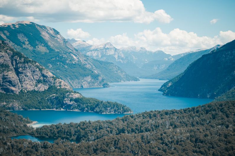 Patagonia Landscape - a large body of water surrounded by mountains