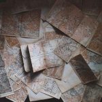Travel Light - maps lying on the floor