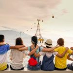 Making Friends - people holding shoulders sitting on wall