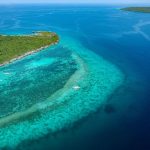 Philippines Beaches - aerial view of green island during daytime