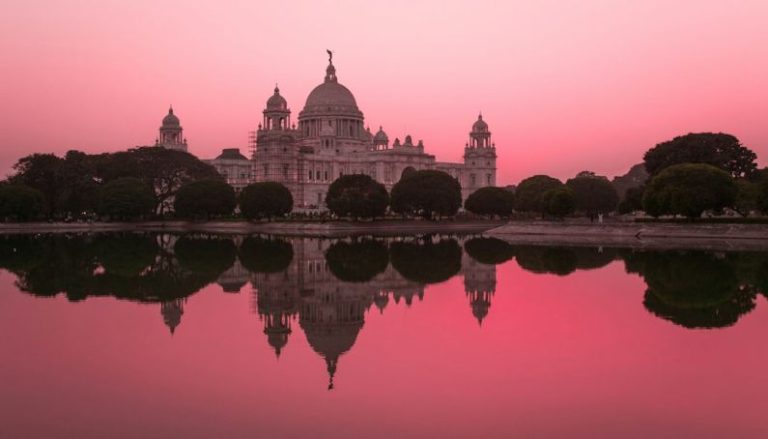 India Ancient - white concrete castle near body of water