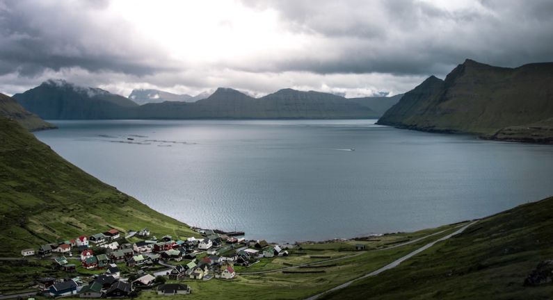 Undiscovered Islands - calm body of water and mountain