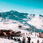 Ski Resort - crowd gathered on snowy mountain park