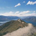 New Zealand Budget - photography of mountain near body of water