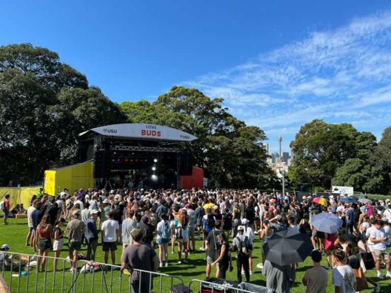 Australia Budget - a crowd of people at a concert