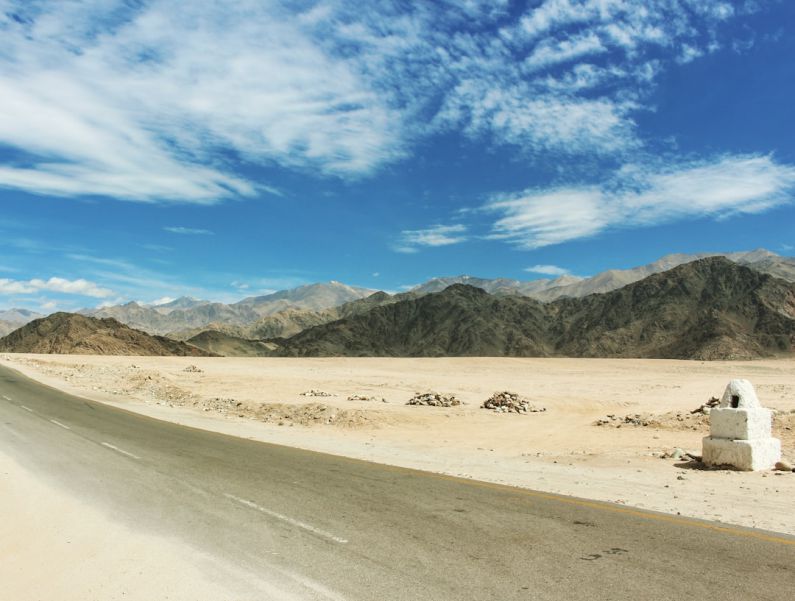 Road Trip Budget - gray concrete road with range mountain view