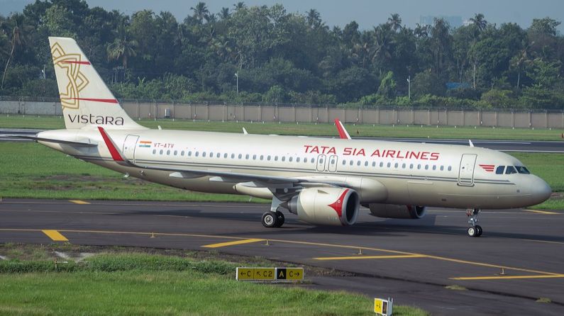 Airline Rewards - white and red passenger plane on airport during daytime