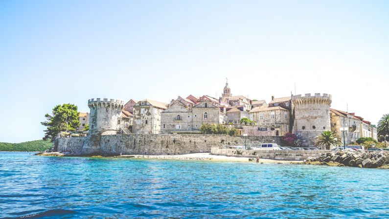 Europe Landmarks - photo of gray concrete establishment near the body of water